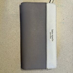 Kate spade wallet. One mark on the leather inside shown in photo.